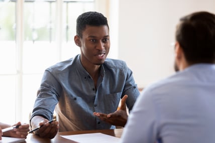 employee shares opinion during a stay interview with his manager